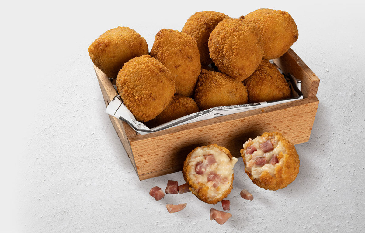 Croquetas artesanas Pascompan para hostelería y retail, con relleno visible.
