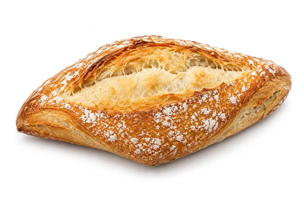 Ración gourmet de pan de 55 gramos con corteza dorada y acabado rústico.